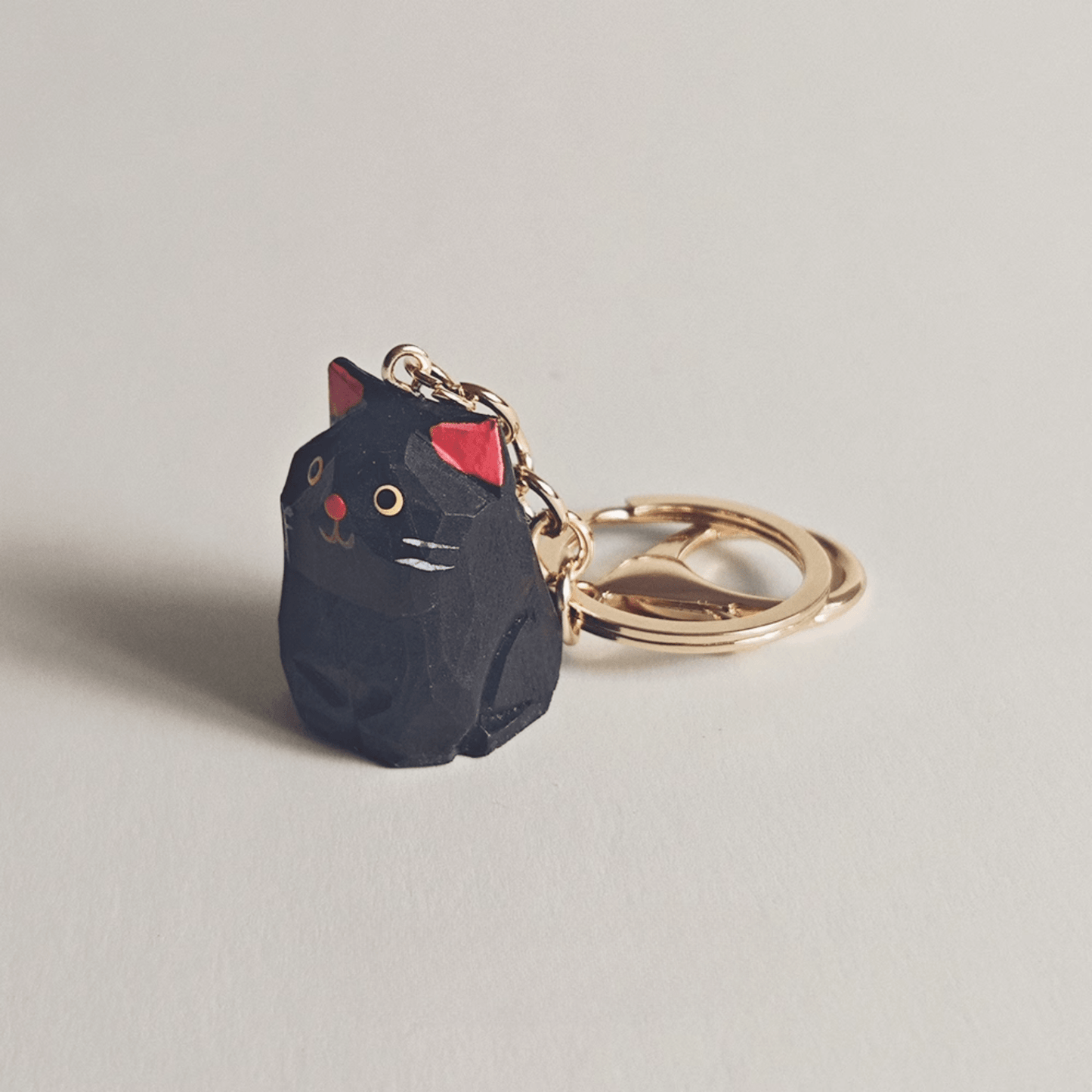 Handcrafted Black Kitty Keychain: Elegance & Nature Combined