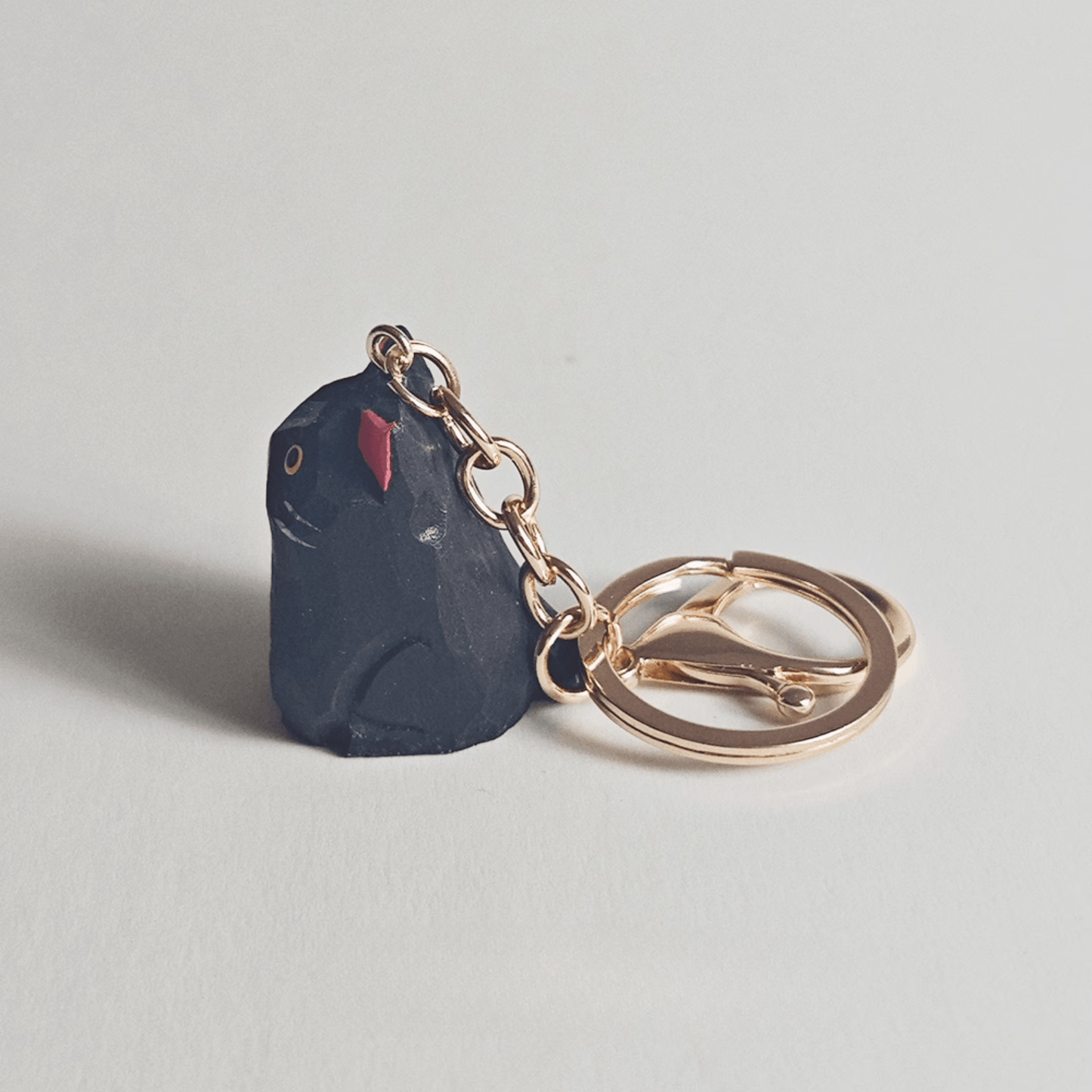 Handcrafted Black Kitty Keychain: Elegance & Nature Combined