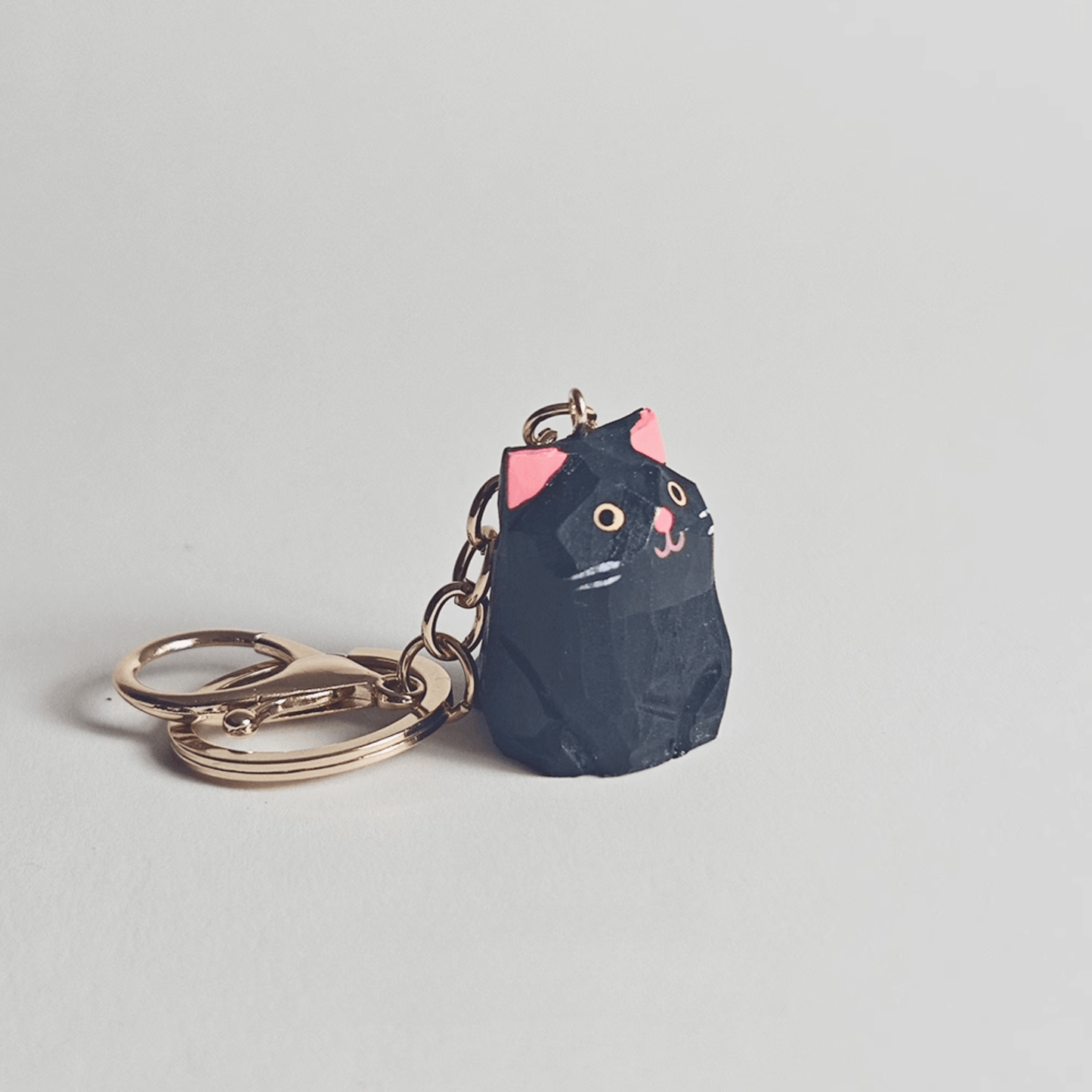Handcrafted Black Kitty Keychain: Elegance & Nature Combined