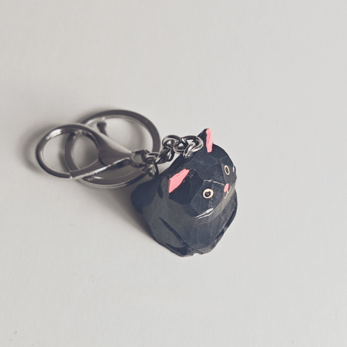 Handcrafted Black Kitty Keychain: Elegance & Nature Combined - REVEALME