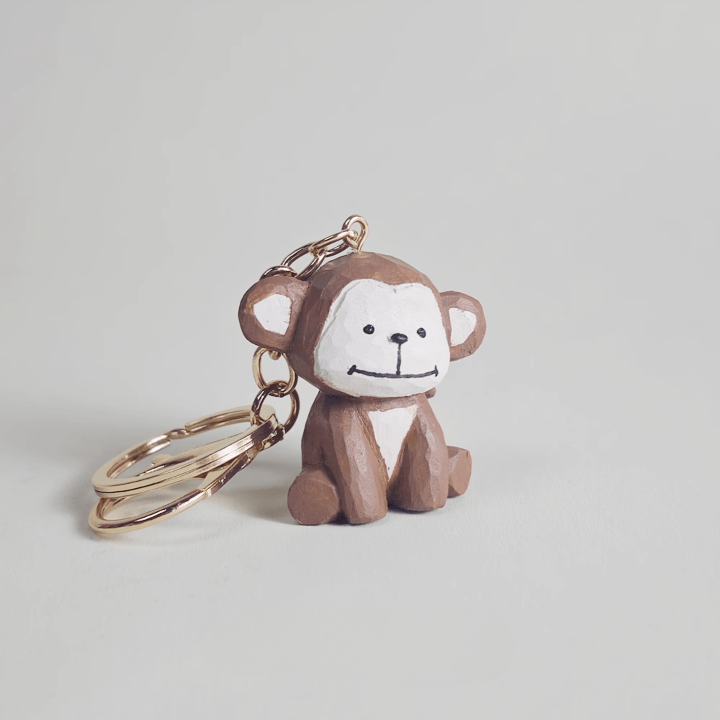Playful Monkey Wooden Keychain - Eco-Friendly & Stylish charm for your keys!