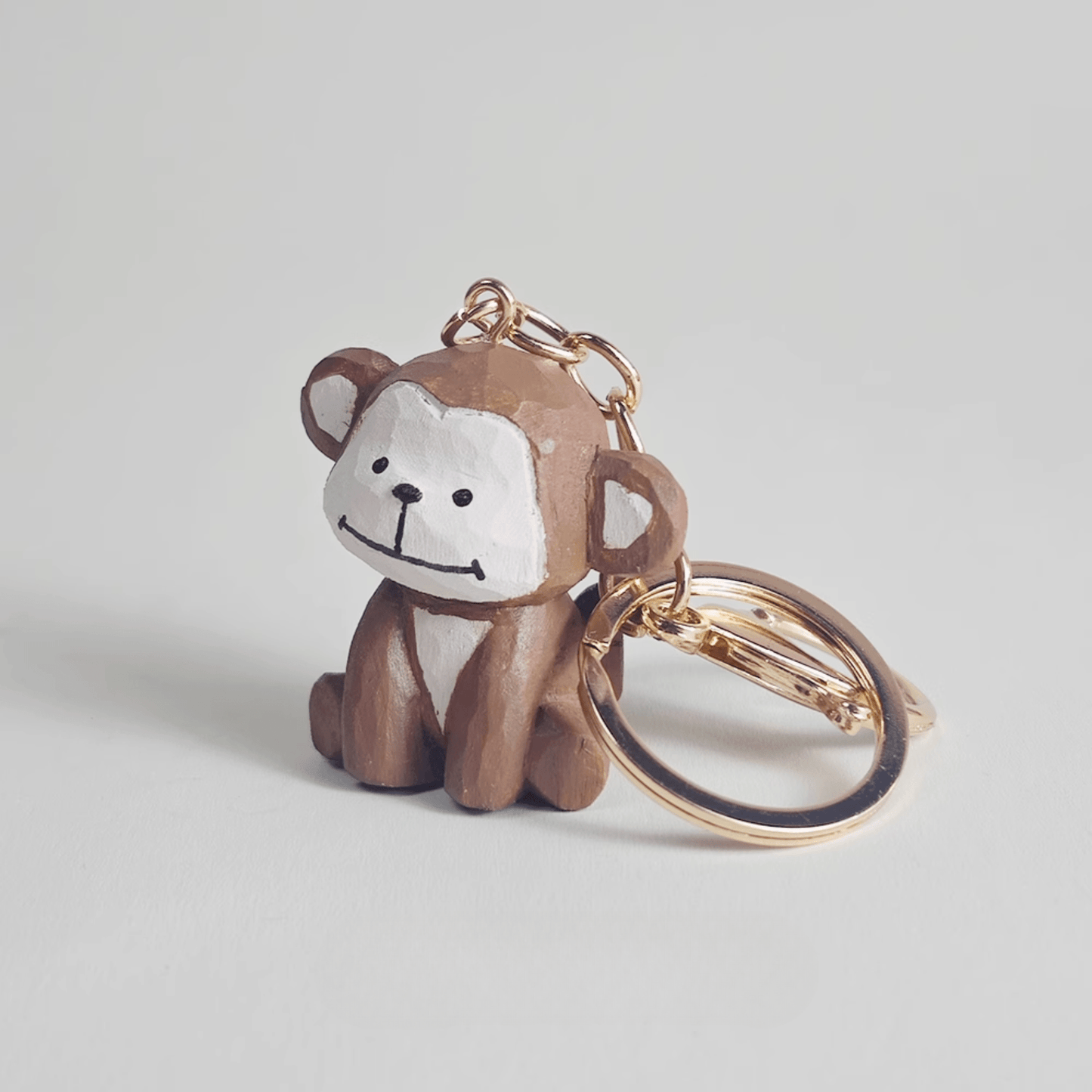 Playful Monkey Wooden Keychain - Eco-Friendly & Stylish charm for your keys!