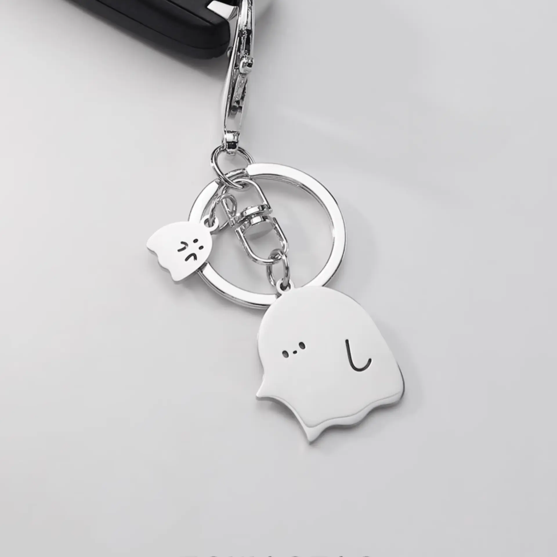 Artisan-Crafted Ghost Metal Keychain: Personalize Your Bag