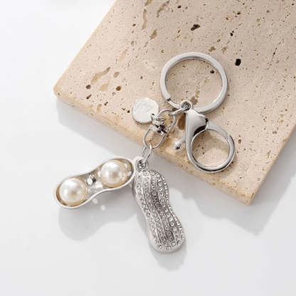 Handmade Peanut Metal Keychain: Whimsical & Playful Accessory for Your Keys