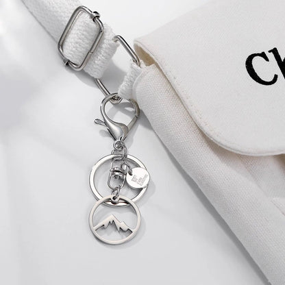 Handmade Snow Mountain Metal Keychain - Adventure Ready!