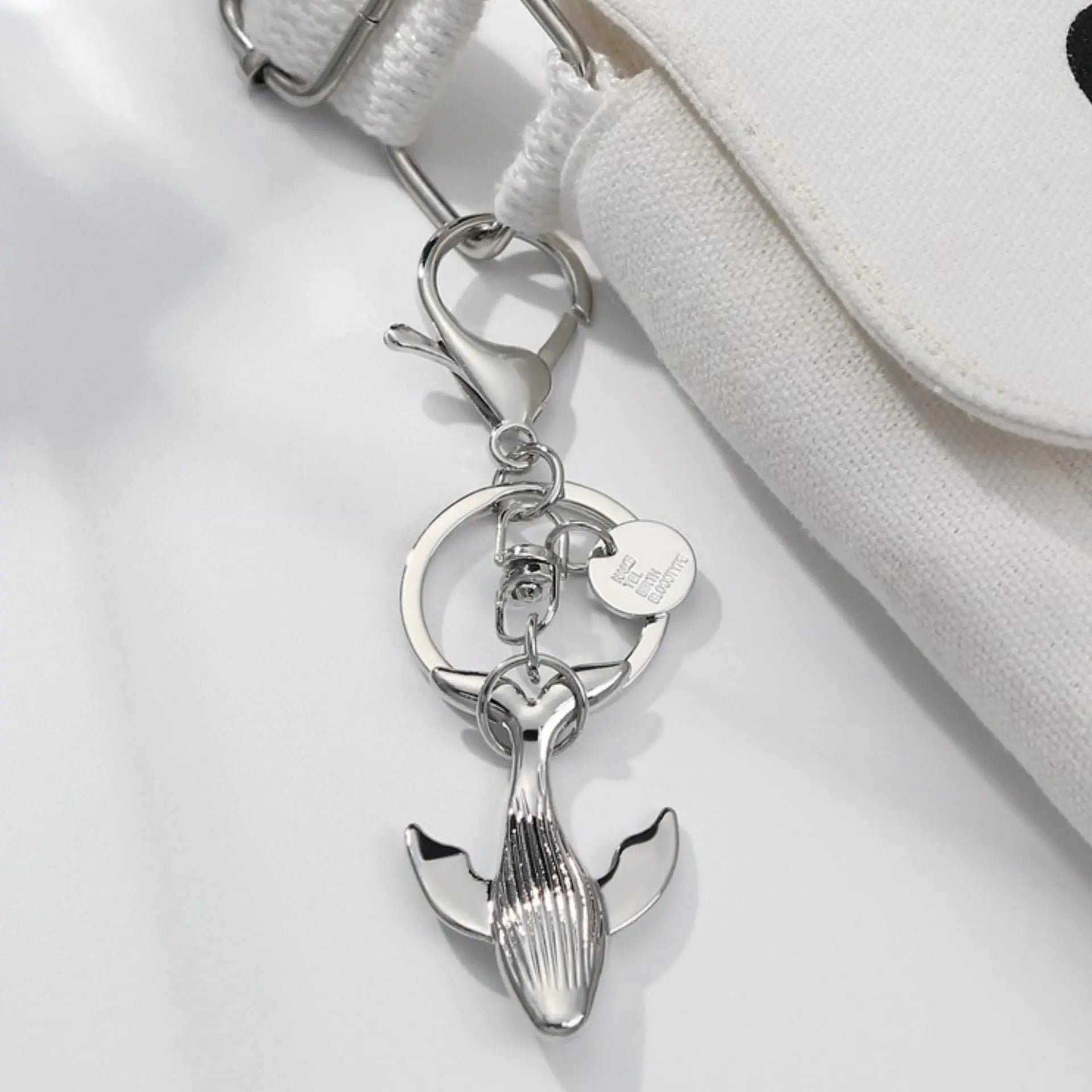 Handmade Whale Metal Keychain: Ocean-inspired Accessory for Adventurers