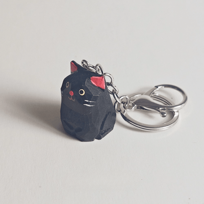 Handcrafted Black Kitty Keychain: Elegance & Nature Combined - REVEALME