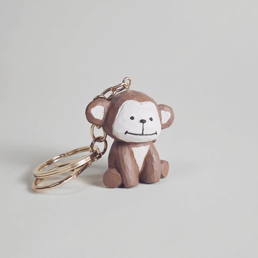 Playful Monkey Wooden Keychain - Eco-Friendly & Stylish charm for your keys!